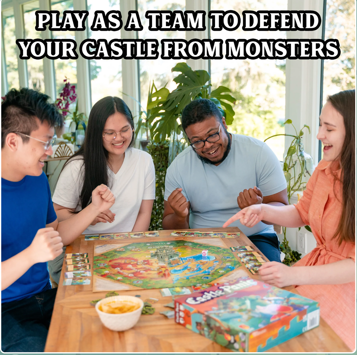 Group of people having fun with Castle Panic Around a table