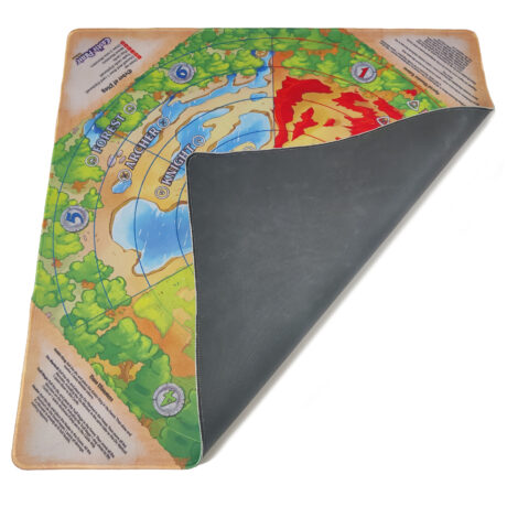 A colorful rubber playmat with one corner flipped over showing a black underside